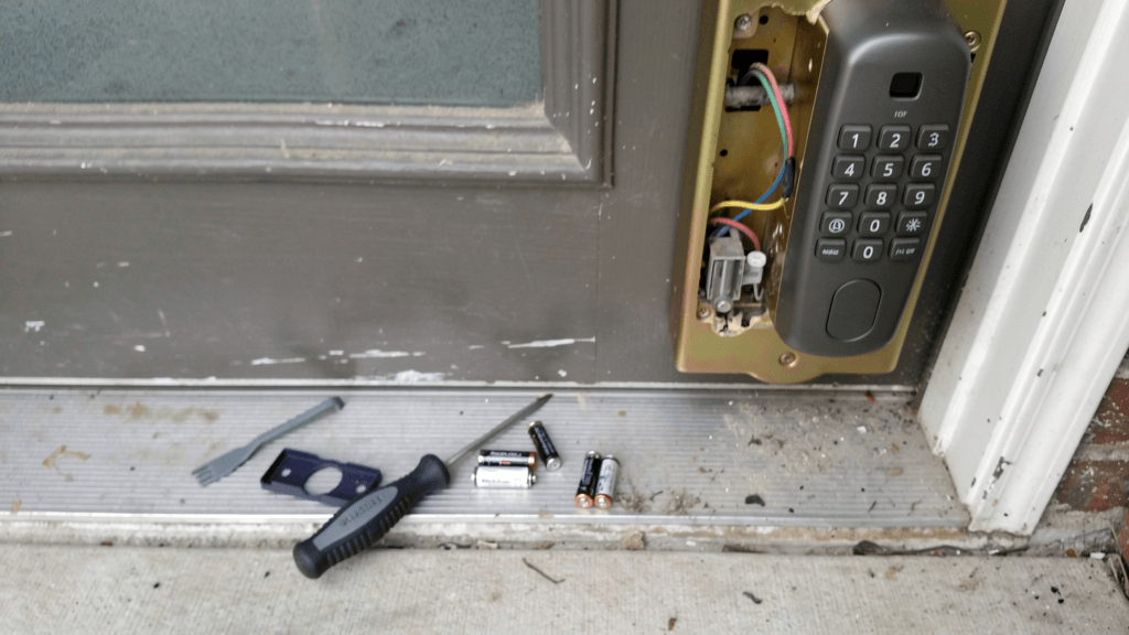 Electronic keypad door lock on a residential entry door